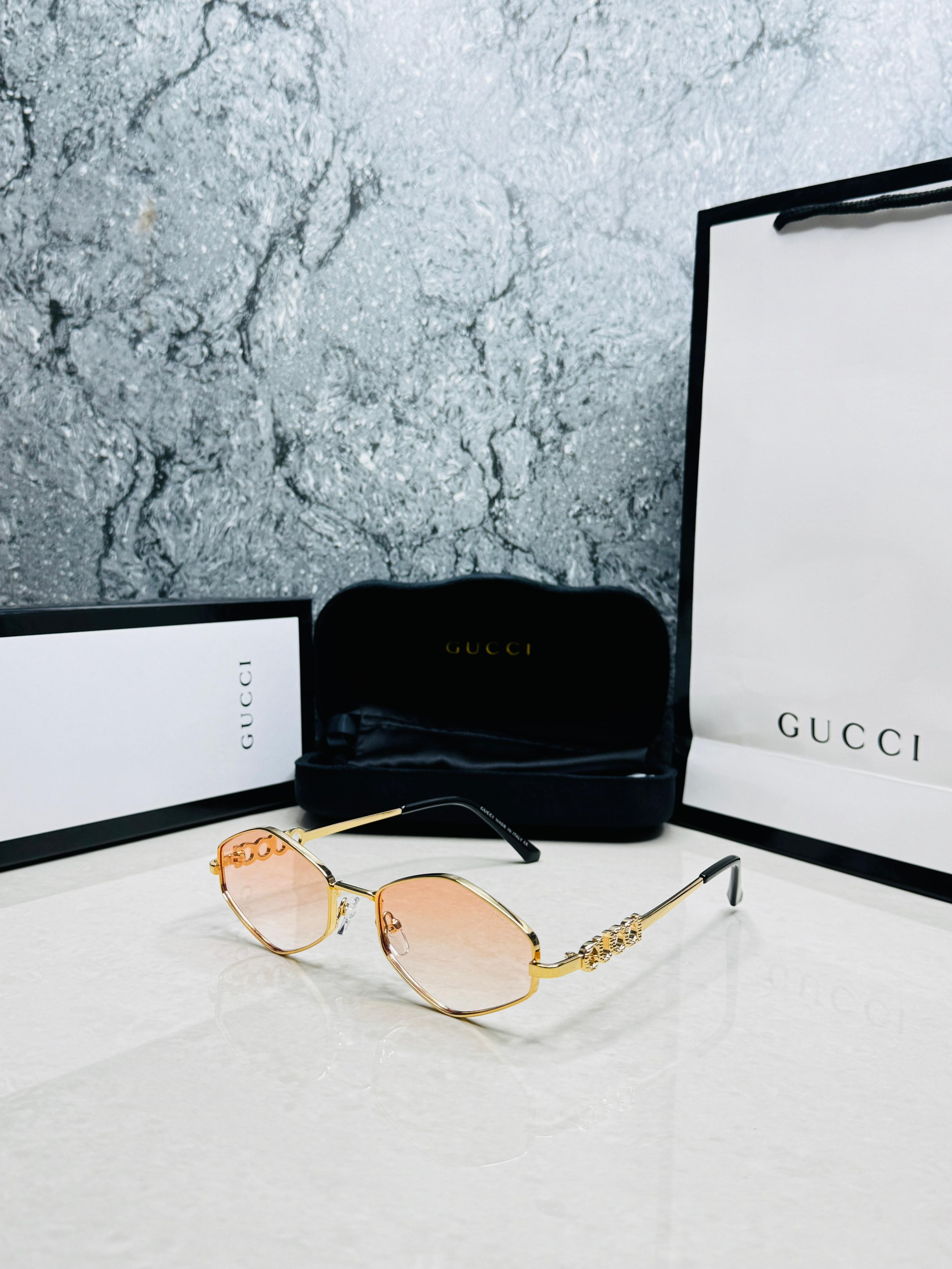 Gucci Geometric Metal Sunglasses - Women