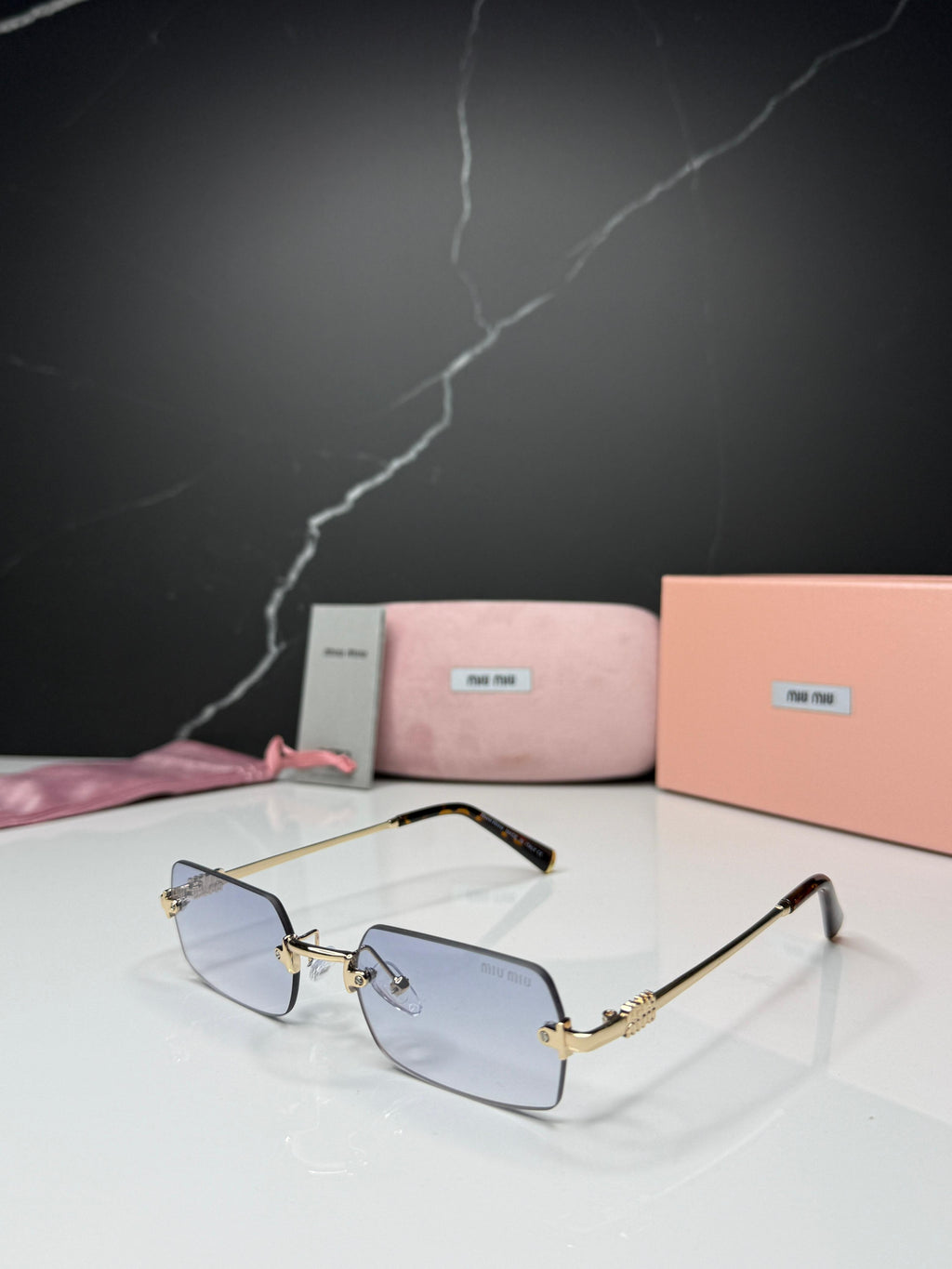 Miu Miu Rimless Sunglasses - Women