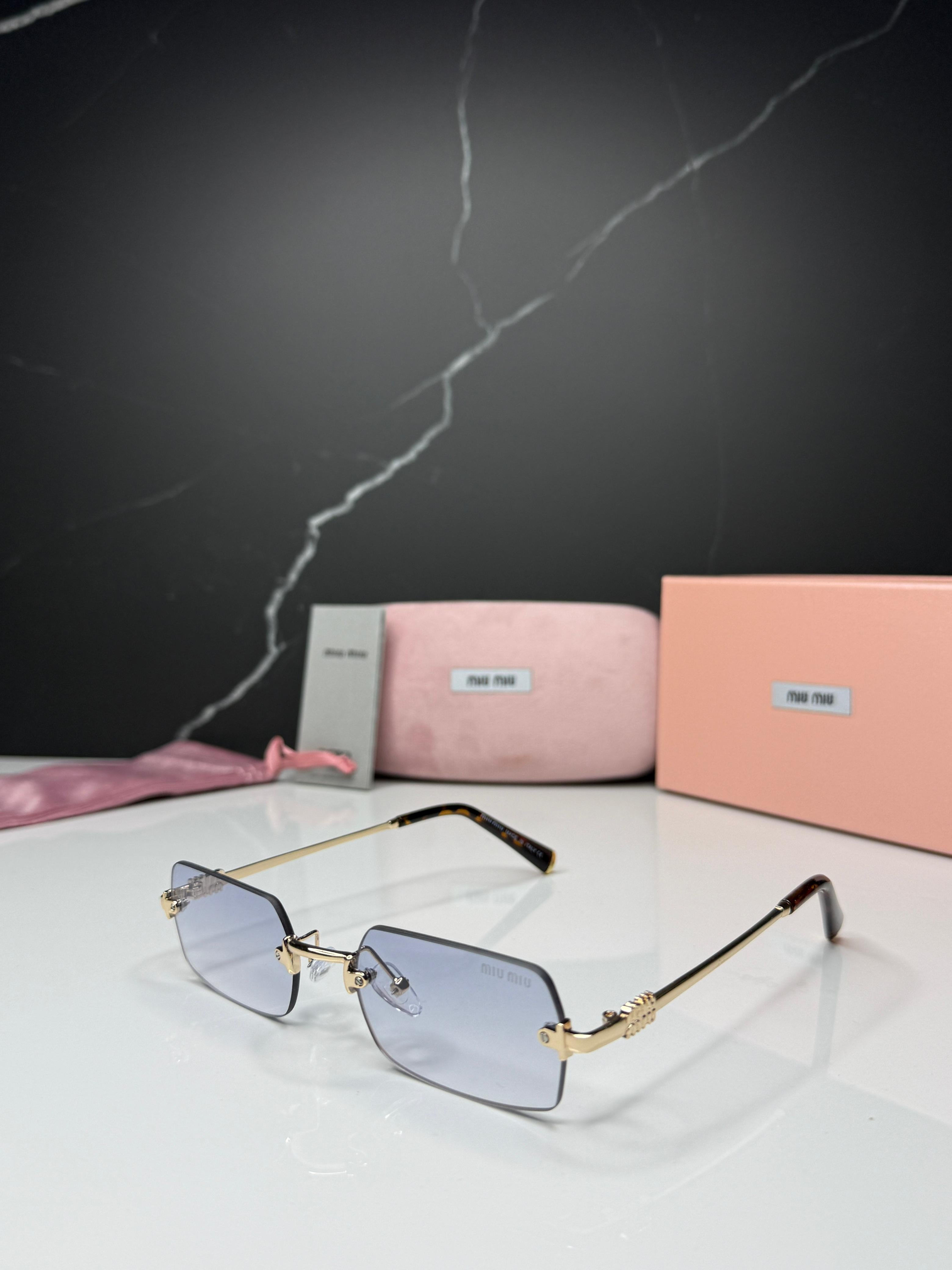 Miu Miu Rimless Sunglasses - Women