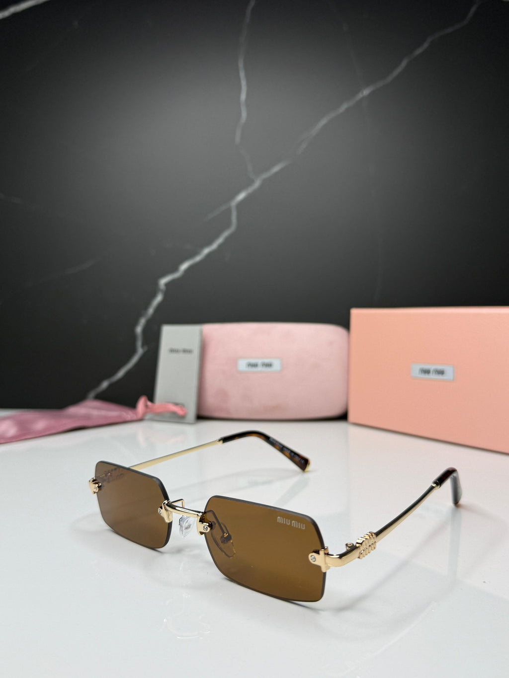 Miu Miu Rimless Sunglasses - Women