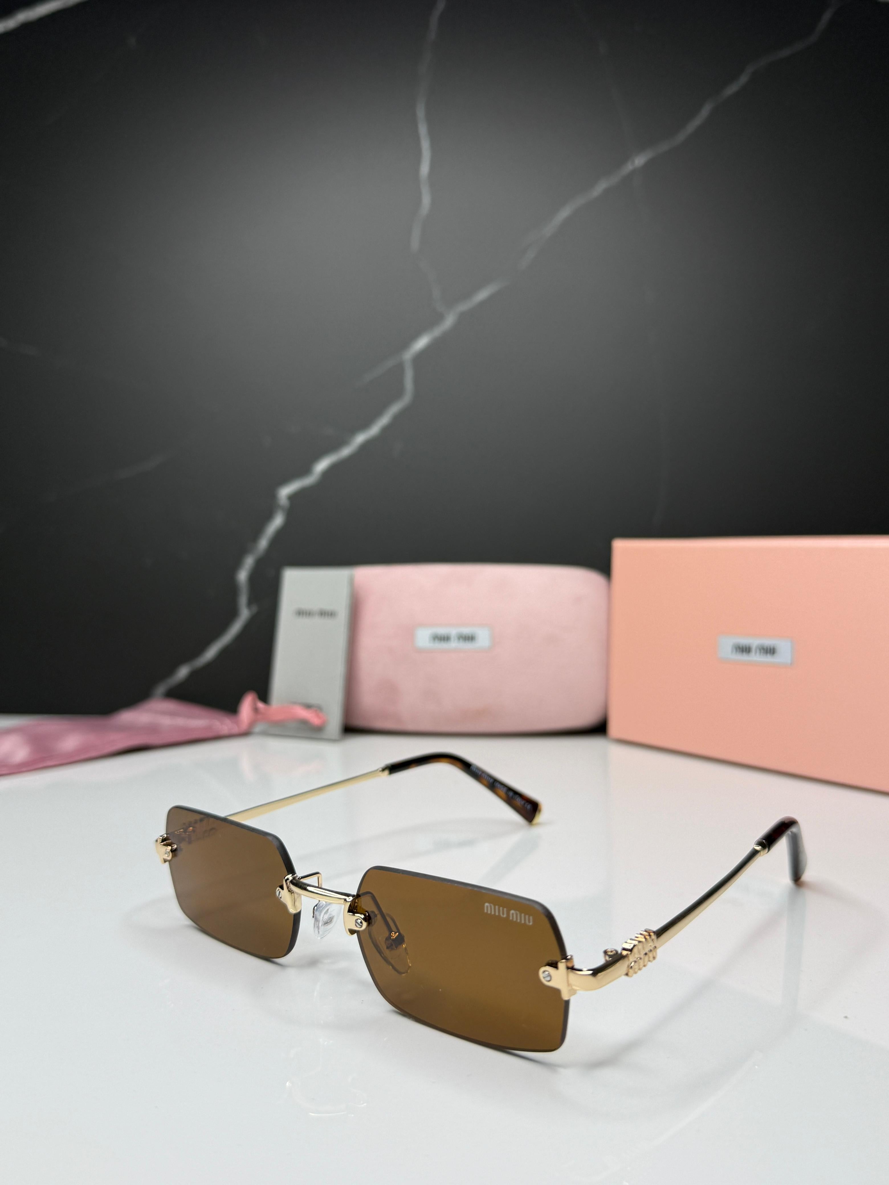 Miu Miu Rimless Sunglasses - Women
